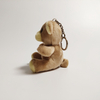 Yd-x008 beer sleutelhanger opgestopte sitende dier met 'n sagte sagte speelding van die t-hemp